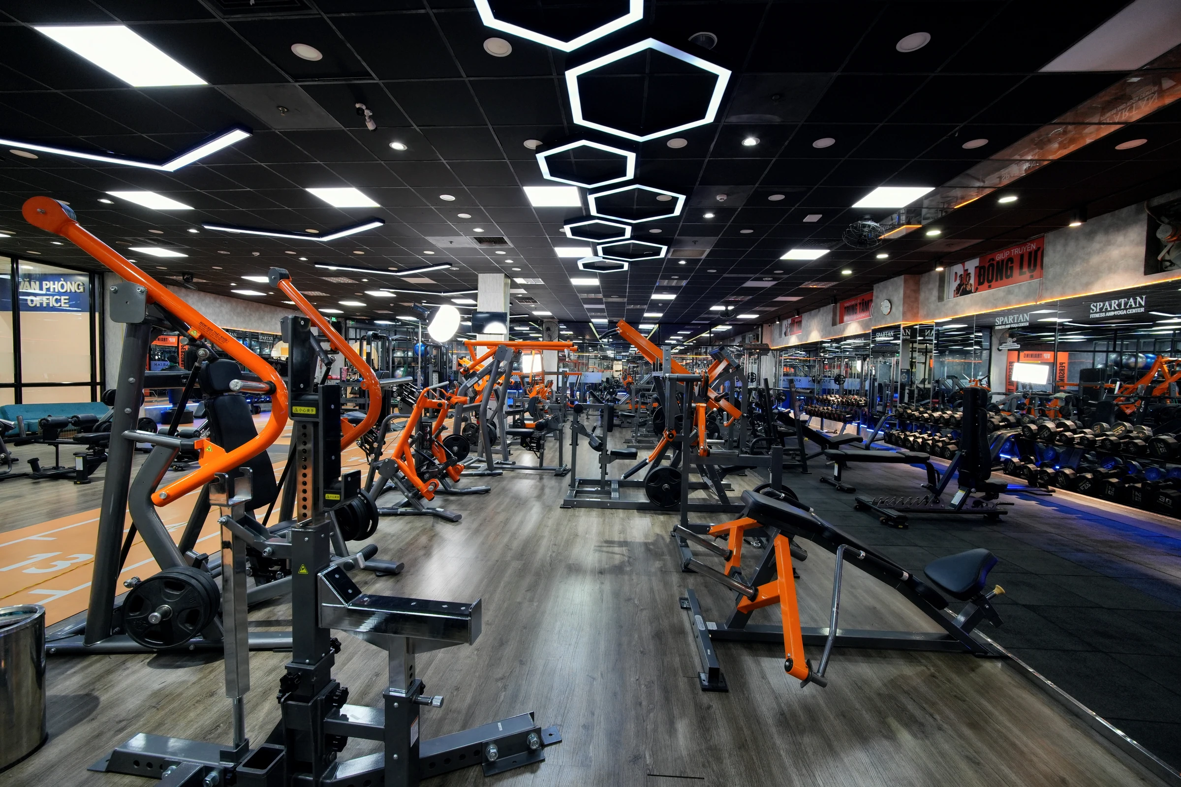 Modern strength machine floor at Spartan Fitness Nha Trang